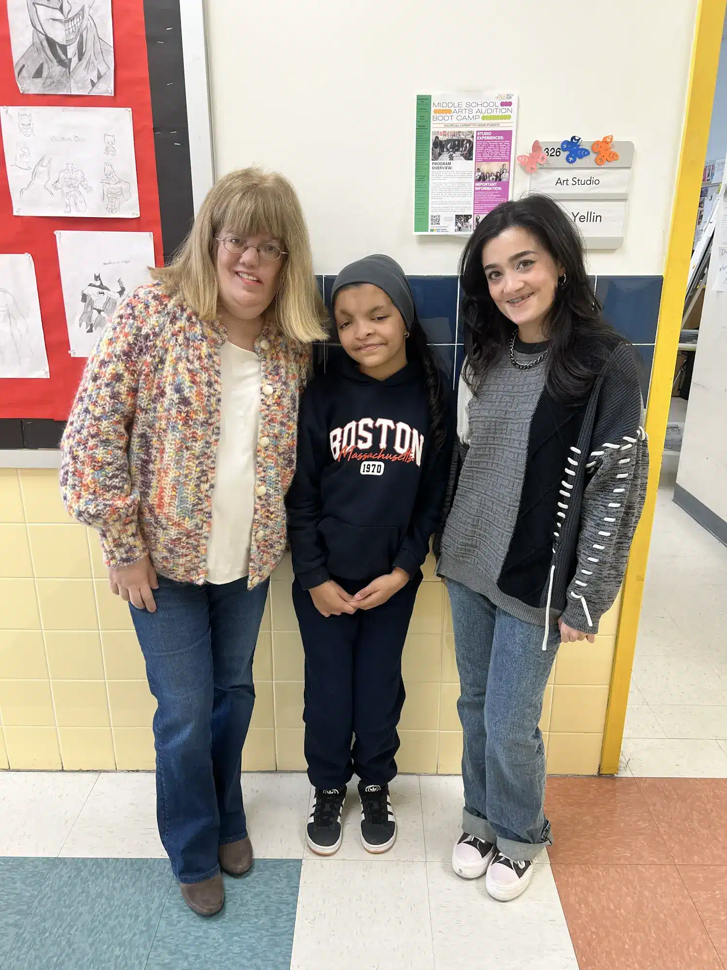dina and naomi posing with wonder kid