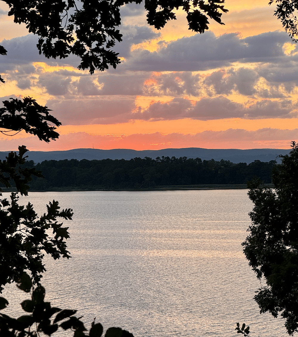 retreat_2 shot of lake and hills at sunset