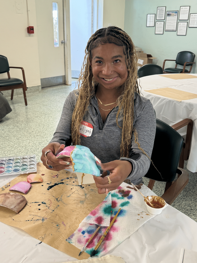 retreat_3 participant working on paper mache