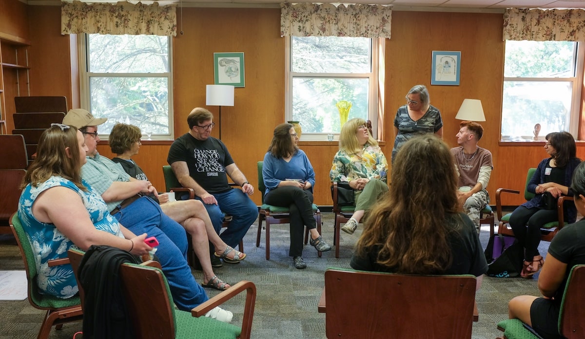 group sitting in discussion circle